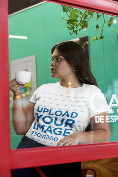 Through-Glass Shot Mockup of a Woman Wearing a Plus Size Tee 30968
