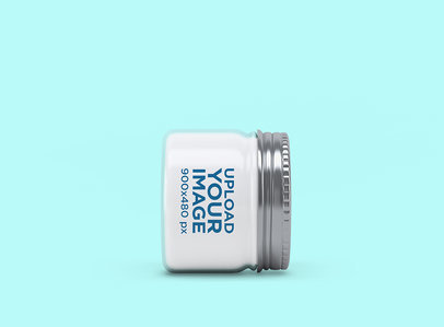Mockup of a Jar Placed Sideways Featuring a Customizable Background
