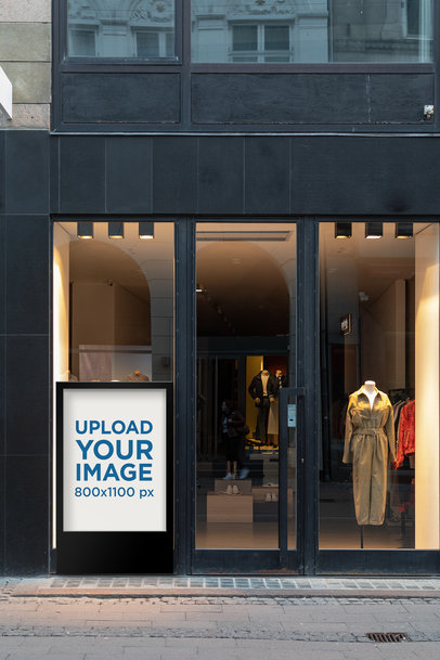 Mockup of a MUPI Placed on an Elegant Boutique Window