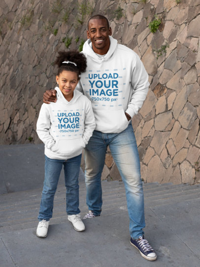 Pullover Hoodie Mockup Featuring a Father and Daughter Posing 
