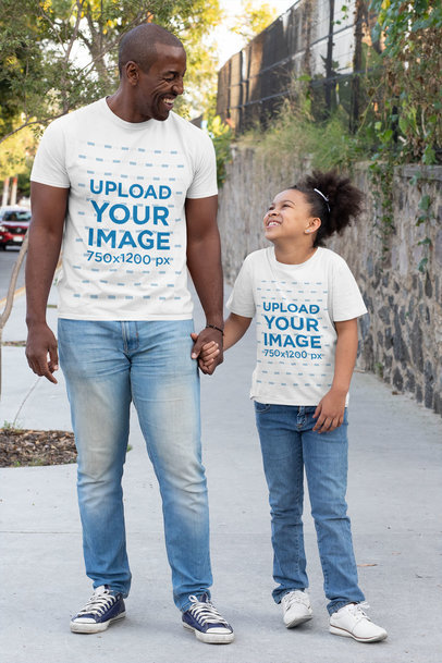 Mockup of a Dad and His Child Wearing T-Shirts on the Street 31392