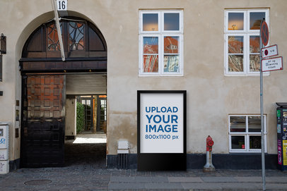 Mupi Mockup Featuring the Facade of an Old Building