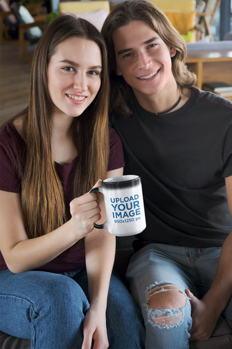 Mockup of a Smiling Couple Holding a 15 oz Mug