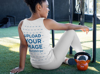 Back View Mockup of a Woman with a Tank Top at a Gym 