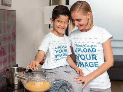 T-Shirt Mockup Featuring a Mom and Her Son Baking in Their Kitchen