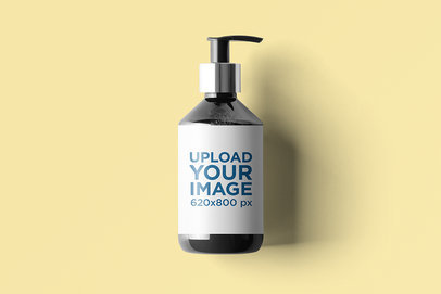 Dispenser Mockup Featuring a Plain Colored Background 