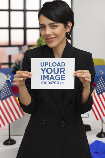 Mockup of a Woman Holding an A5 Flyer for a Political Campaign