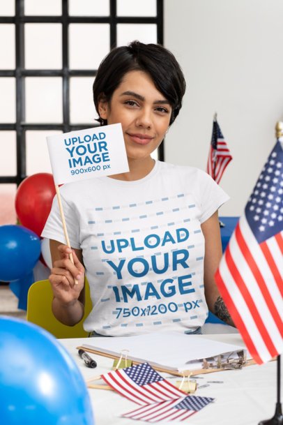 T-Shirt Mockup of a Woman Holding a Flag at a Political Polling Station