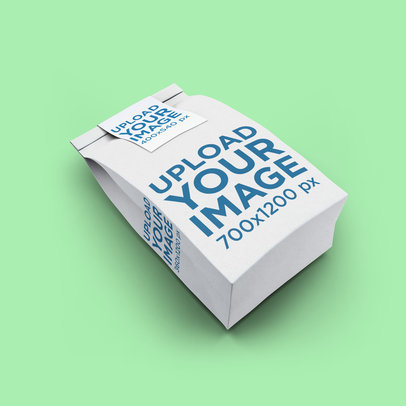Mockup of a Paper Bag Lying on a Solid Color Surface 2584-el1