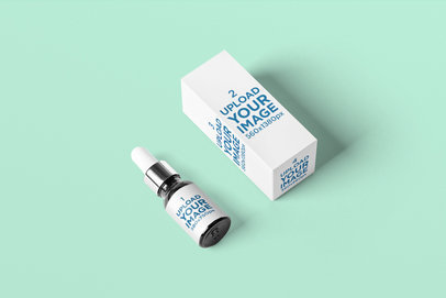 Dropper Mockup Featuring a Packaging Box and a Customizable Background