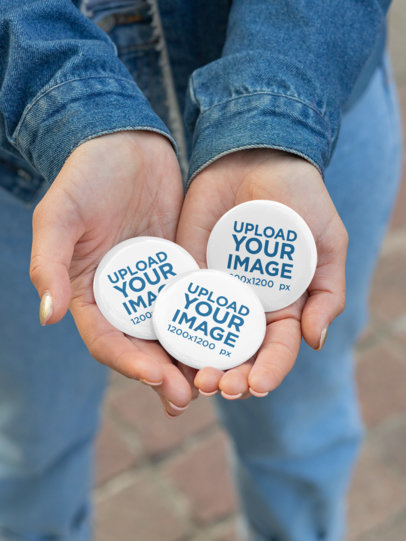 Mockup of a Woman Holding a Bunch of Buttons in Her Hands