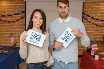 Mockup of Two People Holding Flyers Promoting a Political Campaign