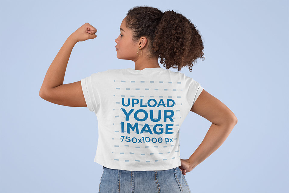 Crop Top Mockup of a Woman Raising Her Arm with Clenched Fist 