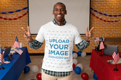 T-Shirt Mockup of a Happy Man at a Polling Place