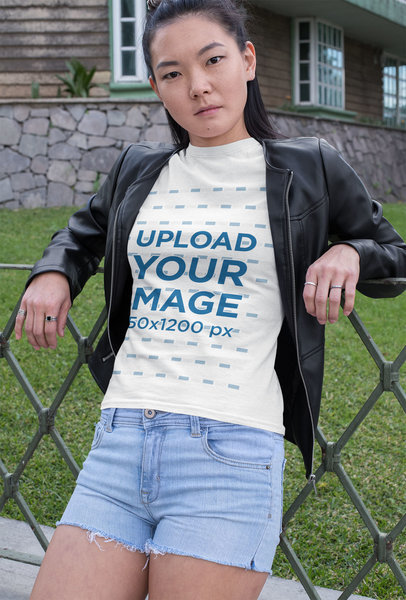 T-Shirt Mockup of a Woman Leaning on a Fence 32056