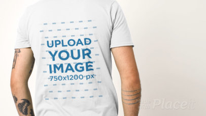 Video of a Man Fixing His T-Shirt While Facing the Other Way