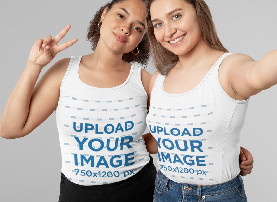 Studio Mockup Featuring Two Women Wearing Tank Tops Taking a Selfie