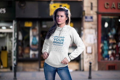 Pullover Hoodie of a Serious Woman Posing in the Street 