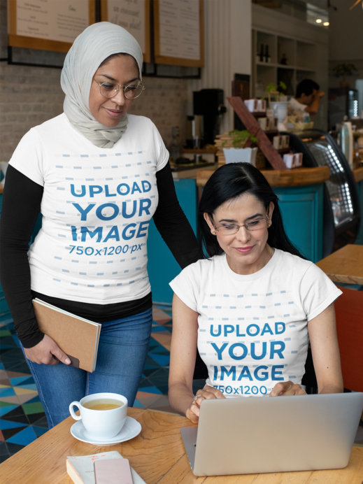 T-Shirt Mockup Featuring Two Women Working Together at a Restaurant 