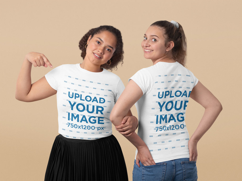 Front and Back T-Shirt Mockup Featuring Two Girl Friends at a Studio 