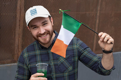 St. Patrick's Day Mockup of a Smiling Man Holding an Ireland Flag 32127