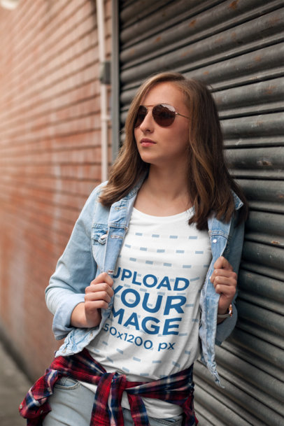 T-Shirt Mockup Featuring a Young Woman Wearing Sunglasses