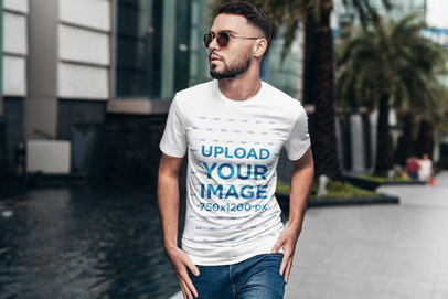Mockup of a Trendy Man Wearing a Crewneck T-Shirt on the Street