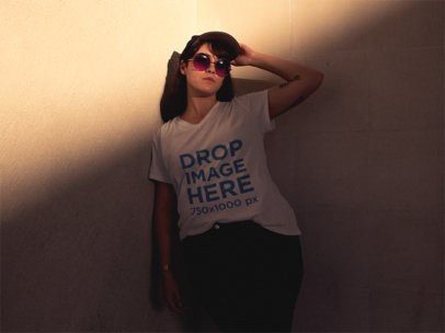 T-Shirt Mockup of a Hipster Woman Wearing Sunglasses