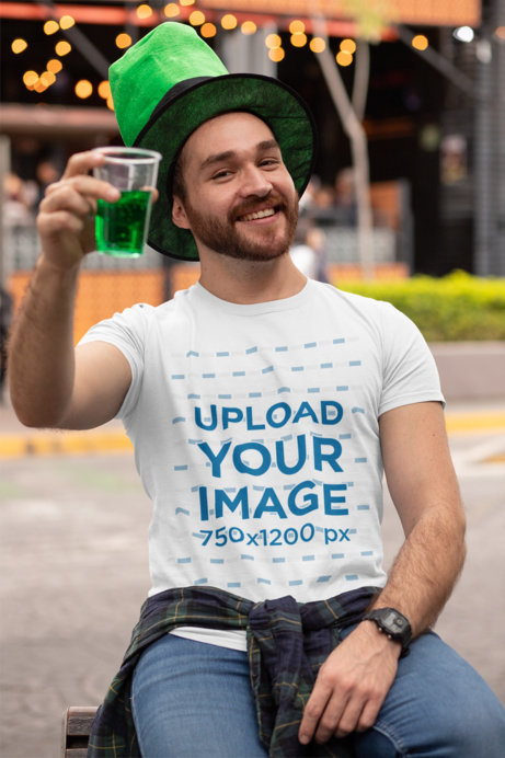 T-Shirt Mockup of a Man at a St Patricks Celebration Drinking a Green Beer 