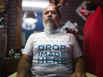T-Shirt Mockup of an Older Man at a Barbershop a12064