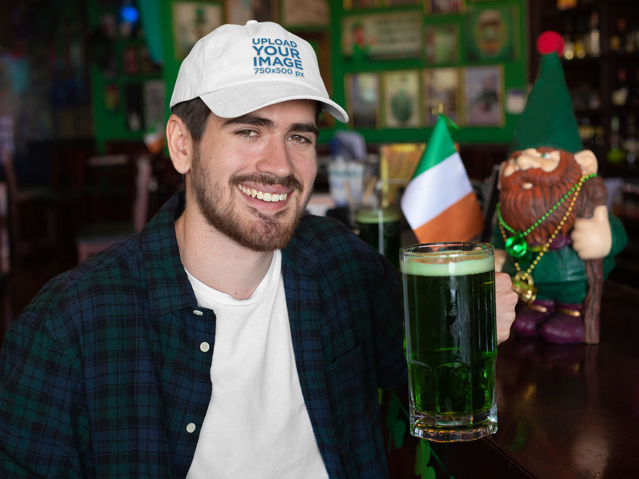 Dad Hat Mockup of a Man Drinking a Beer and Celebrating St. Patrick's Day