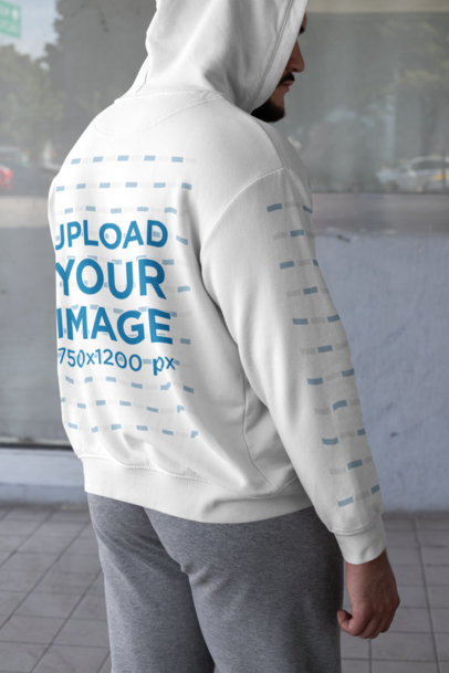 Hoodie Mockup of a Bearded Man Looking over His Shoulder