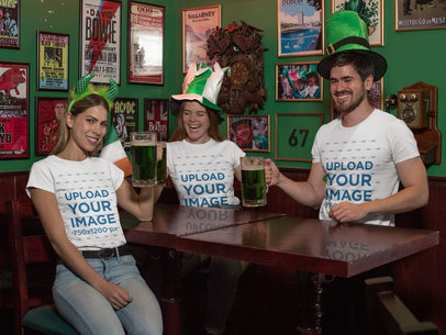 T-Shirt Mockup of a Group of Friends Celebrating Saint Patrick's Day at a Pub