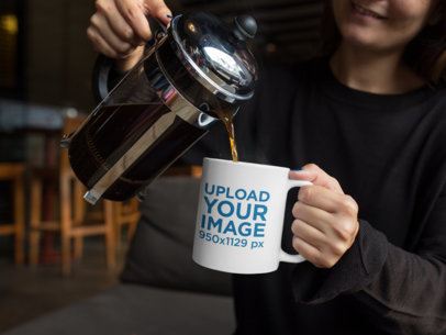 Mug Mockup of a Woman Pouring Herself Coffee