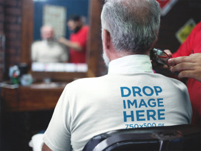 Senior Man at a Barbershop Backside Tee Mockup a12063