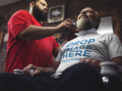 Tee Mockup of an Older Man at a Barbershop a12065