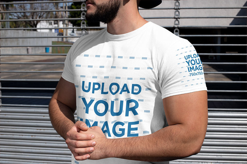 T-Shirt Mockup of a Strong Bearded Man at a Parking Lot