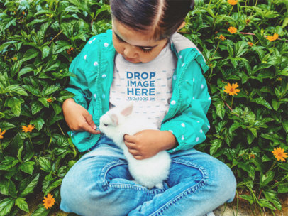Children's T-Shirt Mockup of a Little Girl and a Bunny
