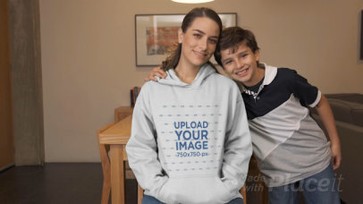 Hoodie Video of a Mom and Her Son Posing in the Living Room 