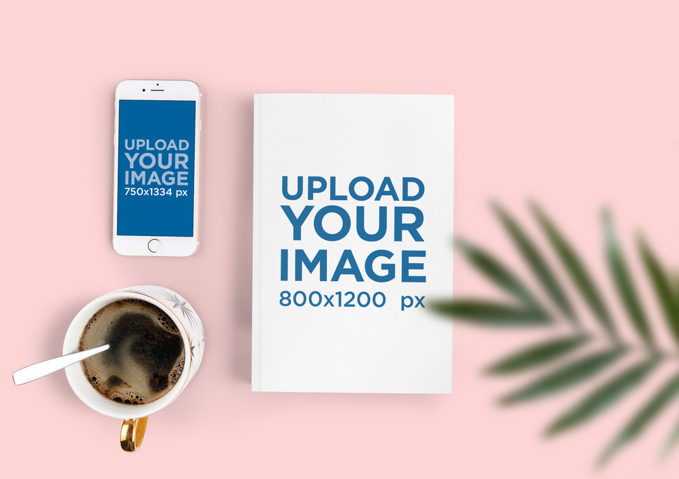 Mockup of an iPhone 8 Placed Next to a Book and a Coffee