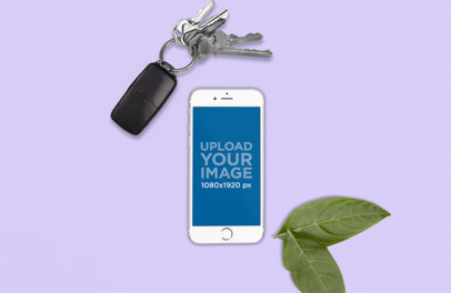 Mockup of an iPhone 8 Plus Placed Next to Some Leaves and Car Keys 2894