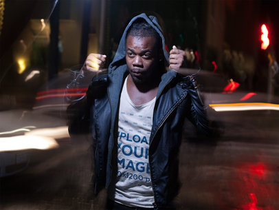 Mockup of a Young Man Out at Night Wearing a Tank Top and Hoodie