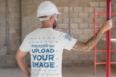 T-Shirt Mockup Featuring the Back View of a Construction Worker