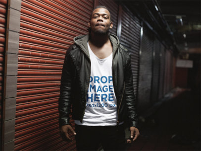 Young Black Man Out at Night Wearing a Hoodie and Tank Top Mockup