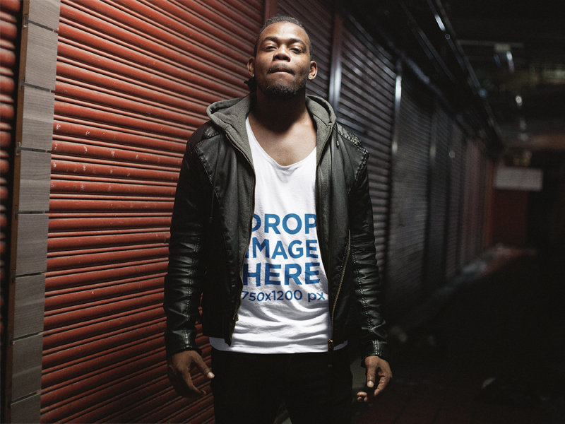 Young Black Man Out at Night Wearing a Hoodie and Tank Top Mockup