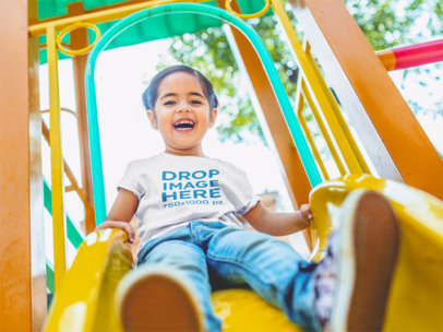 Little Girl Riding Down a Slide T-Shirt Mockup