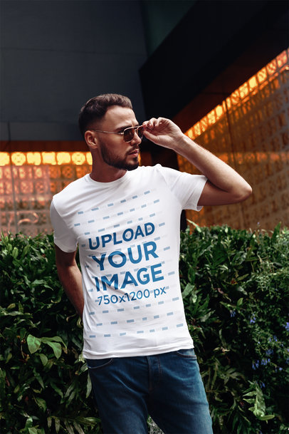 Mockup of a Cool Stylish Man Wearing a Customizable T-Shirt 