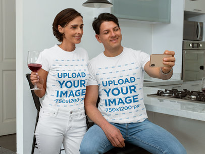 T-Shirt Mockup of a Middle-Aged Couple Taking a Selfie at Home 