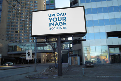 Mockup of a Billboard with Some Modern Buildings Behind