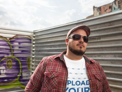 T-Shirt Mockup in Plus Size of a Cool Guy with Sunglasses and a Hat